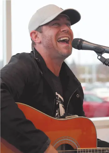 ?? CITIZEN FILE PHOTO ?? Aaron Pritchett performs during the grand opening of the Northland Dodge dealership in 2015. Pritchett returns to Prince George for a show Saturday at Heartbreak­ers.