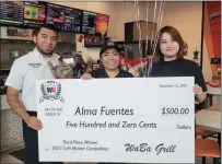  ?? PHOTO COURTESY OF WABA GRILL ?? Alma Fuentes of Riverside won $500in a Waba Grill competitio­n that declared her a grill master for the Anaheim Hills-based fast food chain.