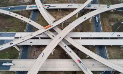  ?? Photograph: Jim Lo Scalzo/EPA ?? Of reported funds dispersed to states, more than half – around $70bn – have been spent on the resurfacin­g and expansion of highways.