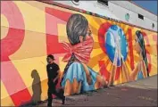  ?? Gary Coronado Los Angeles Times ?? NANI CHACON’S mural graces a wall at Self Help Graphics & Art, part of the new Latinx Arts Alliance.