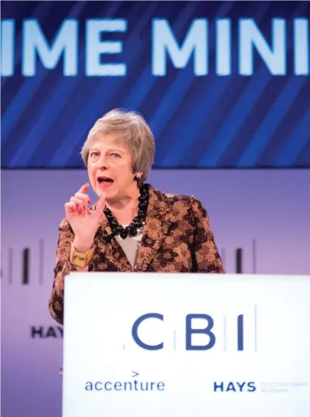  ??  ?? Fighting on: Theresa May at the CBI annual conference in London yesterday.