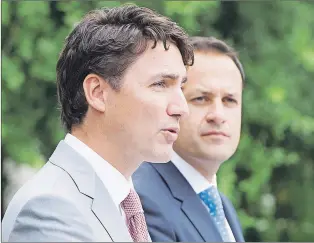  ?? CP PHOTO ?? Prime Minister Justin Trudeau, left, speaks to the media as Irish Taoiseach Leo Varadkar looks on at Farmleigh House on Tuesday in Dublin.