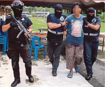  ?? PIX COURTESY OF THE POLICE ?? A man arrested in Tapah is among nine suspects nabbed between March 15 and Tuesday in five states on suspicion of links to the Islamic State.