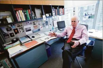  ?? Mary Altaffer / Associated Press ?? Author Roger Angell gestures during an interview at his office at the New Yorker magazine on April 4, 2006, in New York. Angell, a longtime New Yorker writer and editor, has died the New Yorker announced Friday. He was 101. Angell, the son of founding New Yorker editor Katharine White and stepson of E.B. White, contribute­d hundreds of essays and stories to the magazine over a 70-year career.