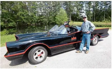  ?? — TNS ?? Dr Latham loves movie props so much that he has built two Batmobiles, including this one, his first Batmobile, that took eight years to build.