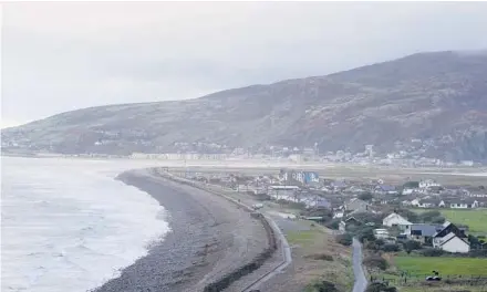  ?? KIRSTY WIGGLESWOR­TH/AP ?? In north Wales, residents in the small coastal village of Fairbourne, above, have been tagged as the U.K.’s first “climate refugees.”