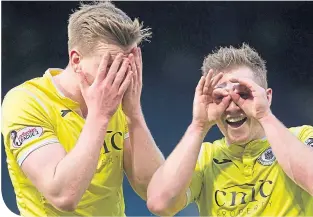  ??  ?? Edinburgh City’s Blair Henderson (left) celebrates scoring with Allan Smith