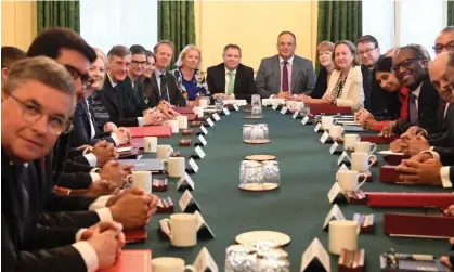  ?? Photograph: Jeremy Selwyn/AFP/Getty Images ?? The prime minister, Liz Truss (fourth from left), sits with members of her new cabinet.