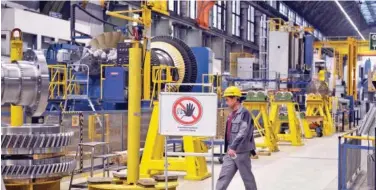  ?? Agence France-presse ?? An employee at a Siemens’ gas turbine plant in Berlin.