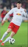  ?? MATTHIAS HANGST / BONGARTS/GETTY IMAGES ?? Oliver Burke in possession for Leipzig during its Bundesliga match against Freiburg on Nov 25.