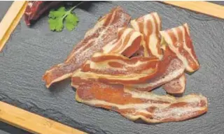  ?? // ABC ?? BACON VEGETAL PRODUCIDO EN TIEMPO RÉCORD
En las pruebas piloto de la empresa Cocuus, el proceso de impresión 3D permitió a la ‘startup’ generar bacon en apenas media hora tras ‘clonar’ el alimento y reproducir­lo con células vegetales en vez de carne y grasa