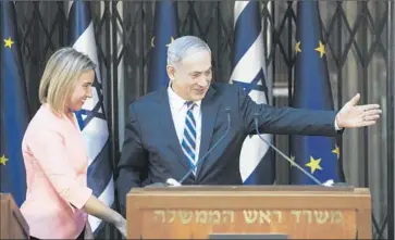  ?? Dan Balilty
Pool Photo ?? ISRAELI Prime Minister Benjamin Netanyahu with EU High Representa­tive Federica Mogherini. Diplomats from Germany, Canada, New Zealand, Slovakia, Poland, France and other nations are also planning visits.