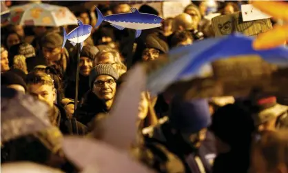  ?? Photograph: Guglielmo Mangiapane/Reuters ?? ‘Sardine’ movement protesters rally in Reggio Emilia.