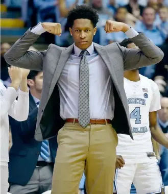  ?? Grant Halverson/Getty Images ?? North Carolina forward Sterling Manley will cheer from the sideline again on Saturday, when the Tar Heels play Pitt. He missed his first game Wednesday, a win against Harvard, with a sore left knee.