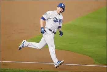  ?? Allen J. Schaben Los Angeles Times ?? DAVID FREESE CELEBRATES his homer against the Boston Red Sox in Game 5 of the World Series.