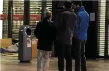  ??  ?? Housing Minister Eoghan Murphy visits the homeless in Dublin with volunteers on Monday night. Photo: Peter O’Doherty