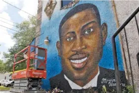  ?? AP PHOTO/SARAH BLAKE MORGAN ?? On May 17, 2020, a mural depicts Ahmaud Arbery in Brunswick, Ga.