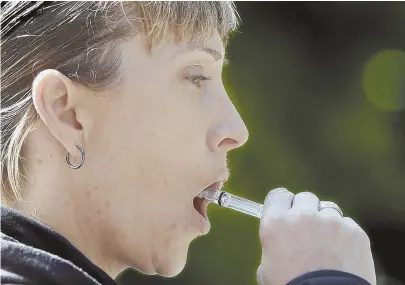 ?? AP FILE PHOTO ?? SOBRIETY CHECKS: California Highway Patrol Sgt. Jaimi Kenyon swabs the inside of her mouth to collect saliva during a demonstrat­ion of drug testing device in 2017. The MSP is testing a similar device.