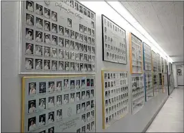  ?? ?? Class photos from throughout the decades line the halls of the CSUB nursing building.