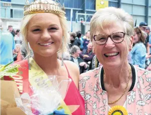  ?? PHOTOS: RICHARD DAVISON ?? Royal succession . . . South Otago A&amp;P Show Queens of 50 years ago and today, Annette Meyer (right) of Alexandra, and Bayley Coates (21), of Balclutha.