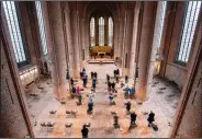  ?? (AP/dpa/Julian Stratensch­ulte) ?? Worshipper­s attend a socially distanced Good Friday service at the Marktkirch­e in Hanover, Germany.