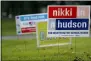  ?? JAY LAPRETE — THE ASSOCIATED PRESS ?? Campaign yard signs line a yard Oct. 7 in Worthingto­n.