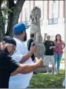  ?? KASSI JACKSON/HARTFORD COURANT ?? A group of Italian-Americans and supporters of Christophe­r Columbus clashed with a group of people who do not support the statue’s presence at Waterbury City Hall on Saturday.