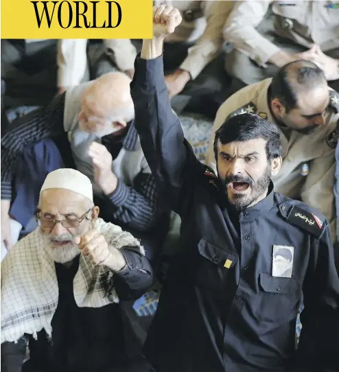  ?? STRSTR / AFP / GETTY IMAGES ?? Iranian worshipper­s shout anti-U.S. slogans during the weekly Friday prayer in Tehran.