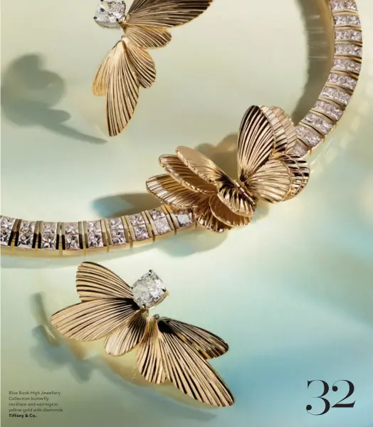  ??  ?? Blue Book High Jewellery Collection butterfly necklace and earrings in yellow gold with diamonds Tiffany & Co.