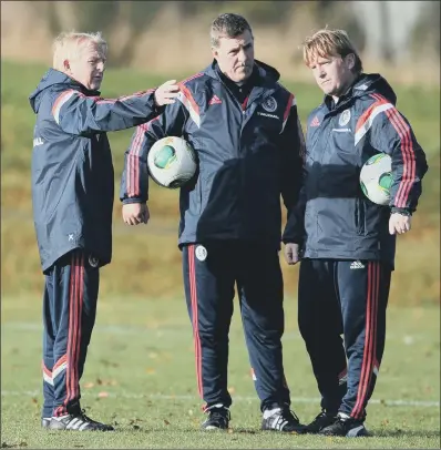  ?? PICTURE: PA ?? WORKING TOGETHER: Erstwhile Scotland manager Gordon Strachan with assistants Mark McGhee and Stuart McCall, right, in 2013.