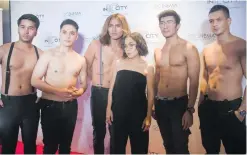  ?? PHOTO FROM TBA STUDIOS ?? De Leon strikes a pose with male models inspired by a scene in the satire movie during its QCinema premiere in November.