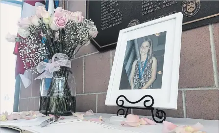  ?? GABRIELLE ROY THE CANADIAN PRESS ?? A photograph of shooting victim Julianna Kozis is seen Wednesday at a memorial assembled by the city of Markham.