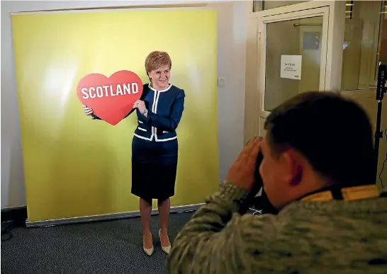  ?? REUTERS ?? Scottish National Party leader and Scottish First Minister Nicola Sturgeon poses for a photo on the sidelines of her party’s conference in Aberdeen yesterday.