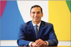  ?? Christian Abraham / Hearst Connecticu­t Media ?? Nikolas Totaro, director and market executive of the Stamford Market at Merrill Lynch Wealth Management, sits in the firm’s offices in Stamford on June 9.