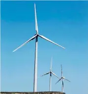  ?? [OKLAHOMAN ARCHIVES] ?? Wind turbines spin near Hobart in 2013. The Oklahoma Corporatio­n Commission has sent proposed emergency rules it has adopted governing wind farm developmen­ts to Gov. Fallin for her review and approval.
