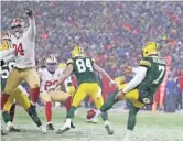  ?? DAN POWERS / USA TODAY NETWORK-WISCONSIN ?? Jordan Willis of the 49ers leaps to block the punt of the Packers punter Corey Bojorquez late in the fourth quarter to produce a game-tying touchdown for San Francisco on Saturday night.