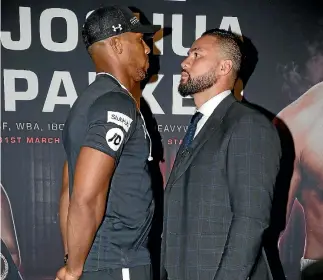  ?? PHOTOSPORT ?? Joseph Parker fighting Anthony Joshua, left, is arguably the biggest one-off sports event of the year for Kiwis.