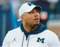  ?? CARLOS OSORIO/AP ?? Maryland football has hired former Alabama, Michigan and Miami assistant Josh Gattis, pictured here with the Wolverines in 2019, as its new offensive coordinato­r and quarterbac­ks coach.