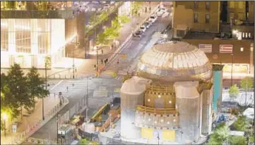  ?? MARK LENNIHAN/AP ?? Work at St. Nicholas National Shrine will resume with a new nonprofit that will collaborat­e with the state and Port Authority to complete constructi­on at the World Trade Center site within two years.