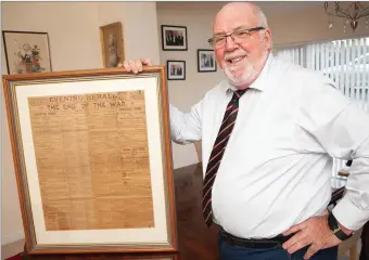  ??  ?? David Tarrant with his copy of the Evening Herald from Armistice Day – November 11, 1918.