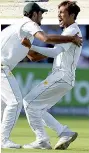  ??  ?? Victory: Mohammad Amir, right, celebrates