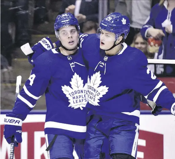  ?? FRANK GUNN/THE CANADIAN PRESS/FILES ?? How the contract negotiatio­ns between the Toronto Maple Leafs and William Nylander, right, are resolved could very well have serious financial repercussi­ons when the entry-level contracts of Auston Matthews, left, and Mitch Marner expire after this season.