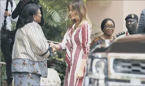  ??  ?? First Lady Melania Trump is greeted by Ghana’s First Lady Rebecca Akufo-Addo at Jubilee House, or the Presidenti­al Palace, in Accra, Ghana.