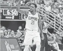  ?? Marco Garcia Associated Press ?? PATRICK BEVERLEY establishe­d himself as the Clippers’ point guard in the preseason, but is nursing a sore right knee.