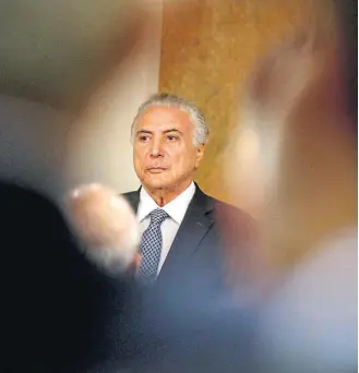  ?? GERALDO BUBNIAK/AGB ?? Indiciado. O presidente Michel Temer durante evento com empresário­s ontem em Curitiba