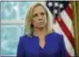  ?? PABLO MARTINEZ MONSIVAIS - THE ASSOCIATED PRESS ?? Homeland Security Secretary Kirstjen Nielsen listens to President Donald Trump address members of the media before Trump signs an executive order to end family separation­s at the border, during an event in the Oval Office of the White House in...