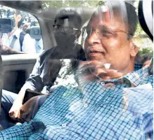  ?? ?? DELHI HEALTH MINISTER Satyendar Jain, arrested in connection with a money laundering case, being taken to a court in New Delhi on May 31. He continues to be an AAP Minister despite being booked on corruption charges.