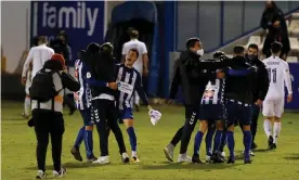 ?? Photograph: Manuel Lorenzo/EPA ?? Alcoyano players celebrate after their famous victory against Real Madrid.