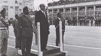  ?? (Wikimedia Commons) ?? PRIME MINISTER Levi Eshkol is greeted at Entebbe Airport in Uganda by chief of staff Idi Amin in 1966.