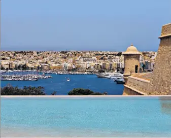  ?? ?? Magical Malta: look down on Valletta harbour from the infinity pool of the Hotel Phoenicia